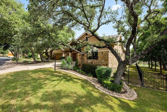 29 Prestonwood Cir, Lakeway, TX 78734 - view of property hidden behind natural elements featuring stucco siding, concrete driveway, stone siding, and a garage