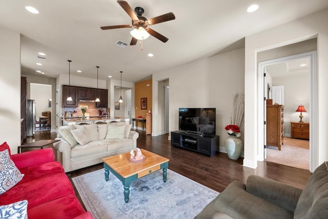 29 Prestonwood Cir, Lakeway, TX 78734 - living room featuring a ceiling fan, recessed lighting, and dark wood-type flooring