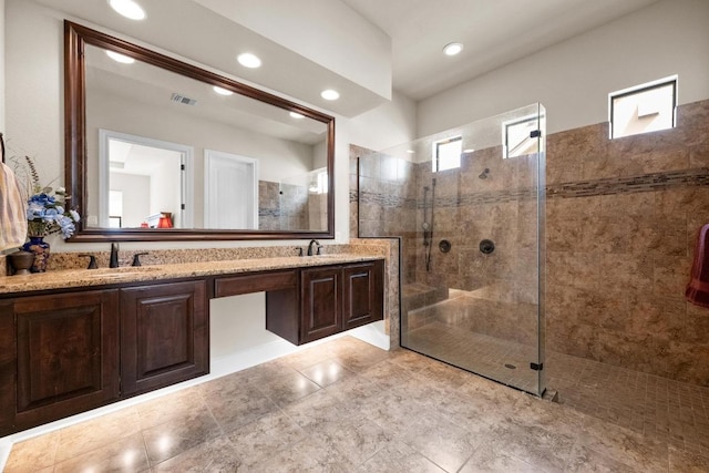 29 Prestonwood Cir, Lakeway, TX 78734 - bathroom featuring walk in shower, double vanity, and recessed lighting