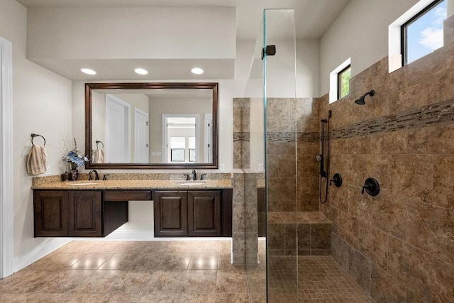 29 Prestonwood Cir, Lakeway, TX 78734 - full bathroom featuring tiled shower, double vanity, and recessed lighting