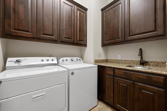 29 Prestonwood Cir, Lakeway, TX 78734 - washroom with cabinet space and washer and clothes dryer