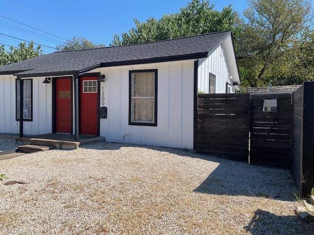 1305 Salina St Unit 1, Austin, TX 78702 - view of front of home featuring a shingled roof