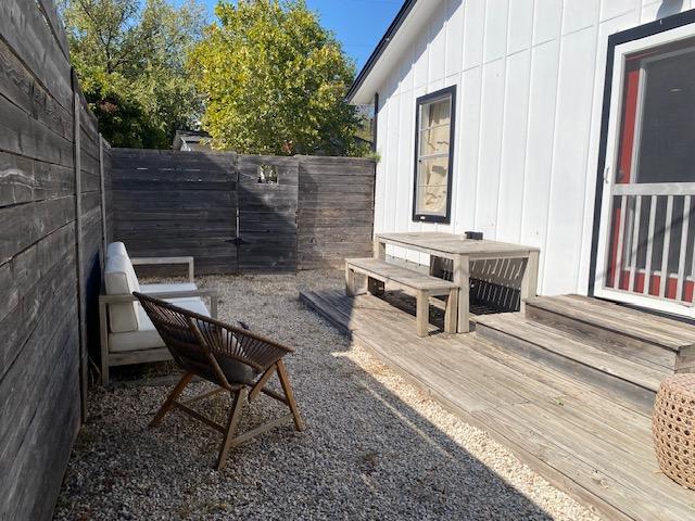1305 Salina St Unit 1, Austin, TX 78702 - fenced backyard featuring a deck