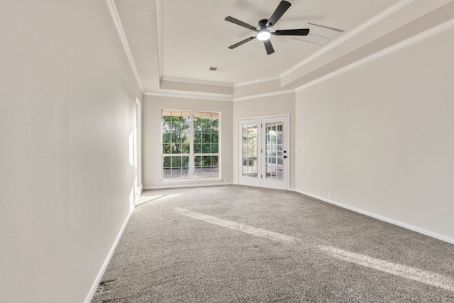 11208 Cedarcliffe Dr, Austin, TX 78750 - spare room featuring a raised ceiling, carpet floors, a ceiling fan, and ornamental molding