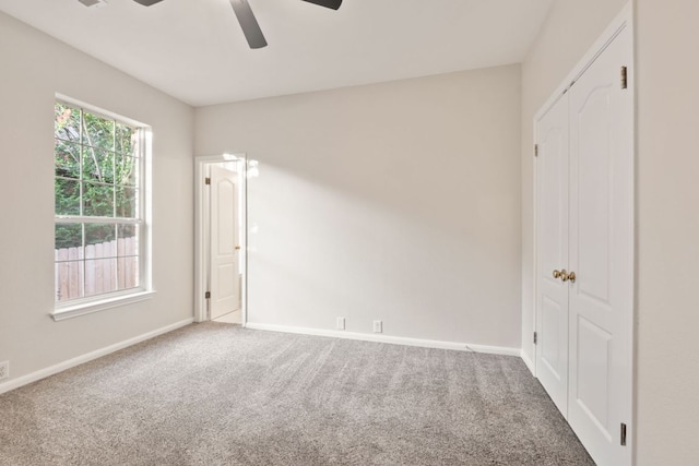11208 Cedarcliffe Dr, Austin, TX 78750 - unfurnished bedroom featuring carpet, a closet, and ceiling fan