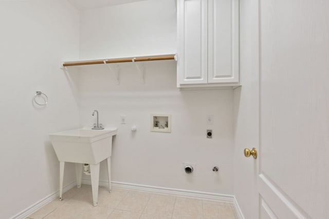 11208 Cedarcliffe Dr, Austin, TX 78750 - washroom featuring hookup for a gas dryer, electric dryer hookup, cabinet space, and washer hookup