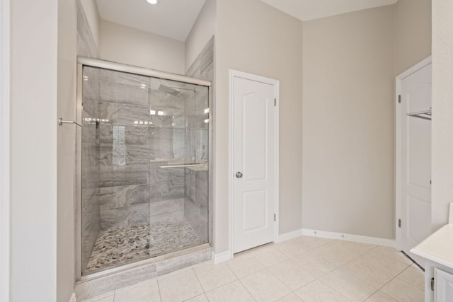 11208 Cedarcliffe Dr, Austin, TX 78750 - bathroom featuring a shower stall, vanity, and tile patterned flooring