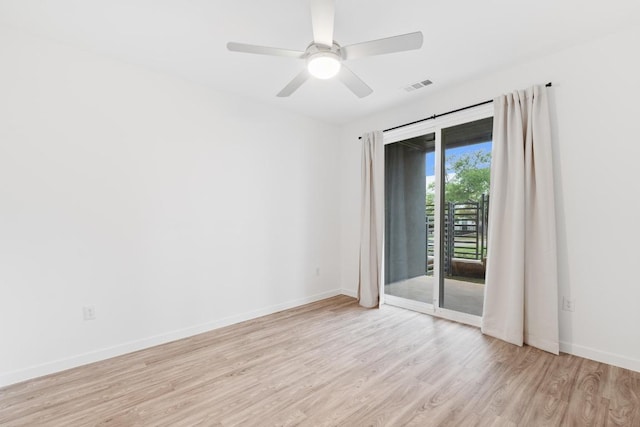 4801 Springdale Dr Unit 2010, Austin, TX 78723 - unfurnished room with light wood-style flooring and a ceiling fan