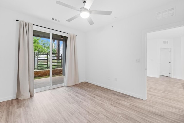 4801 Springdale Dr Unit 2010, Austin, TX 78723 - spare room featuring light wood-type flooring and a ceiling fan