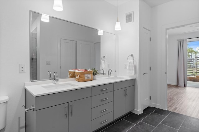 4801 Springdale Dr Unit 2010, Austin, TX 78723 - bathroom featuring double vanity and tile patterned floors