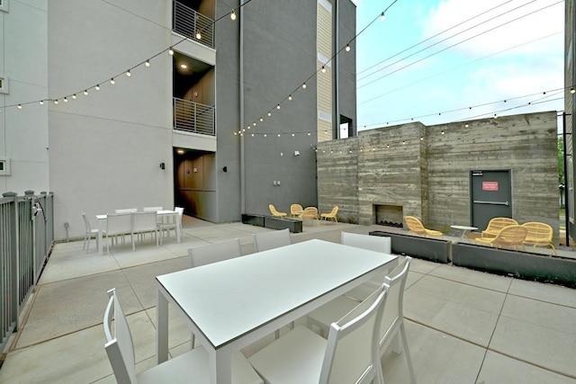 4801 Springdale Dr Unit 2010, Austin, TX 78723 - view of patio featuring outdoor dining area
