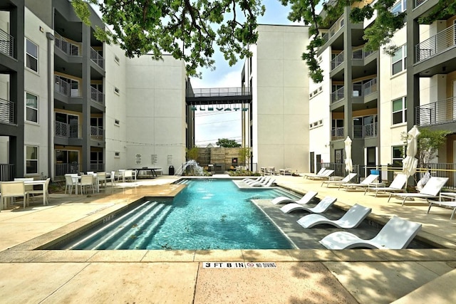 4801 Springdale Dr Unit 2010, Austin, TX 78723 - community pool with a patio area