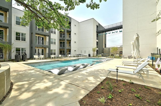 4801 Springdale Dr Unit 2010, Austin, TX 78723 - community pool with a patio