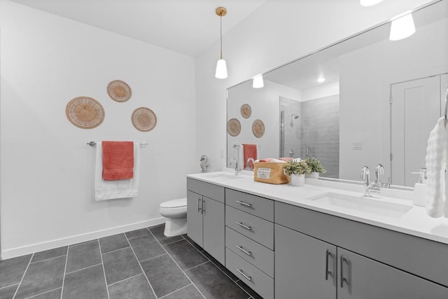 4801 Springdale Dr Unit 2010, Austin, TX 78723 - bathroom with double vanity, a stall shower, and tile patterned flooring