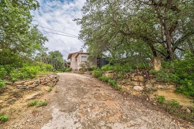 15102 Iowa St, Austin, TX 78734 - view of yard featuring driveway