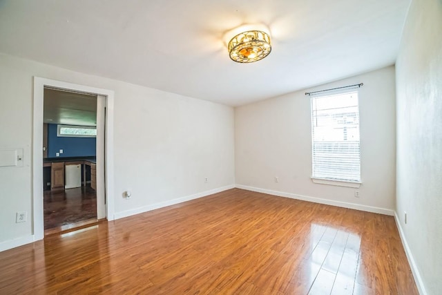 15102 Iowa St, Austin, TX 78734 - spare room featuring wood finished floors and baseboards