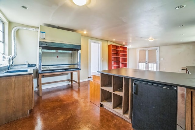 15102 Iowa St, Austin, TX 78734 - kitchen with finished concrete floors, recessed lighting, french doors, refrigerator, and open shelves