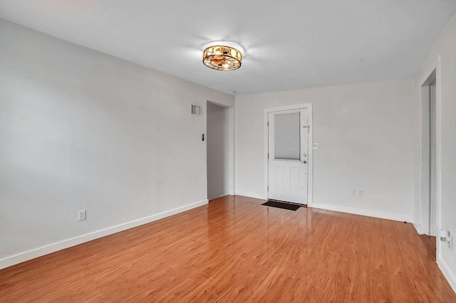 15102 Iowa St, Austin, TX 78734 - empty room with light wood-style flooring and baseboards