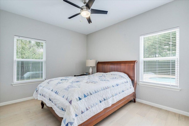 9110 Scotsman Dr, Austin, TX 78750 - bedroom featuring wood finished floors and a ceiling fan