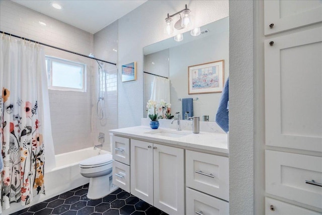 9110 Scotsman Dr, Austin, TX 78750 - full bathroom with vanity, tile patterned floors, and shower / tub combo