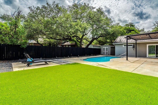 9110 Scotsman Dr, Austin, TX 78750 - view of swimming pool featuring a patio, a storage unit, and a fenced backyard