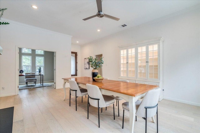 9110 Scotsman Dr, Austin, TX 78750 - dining space featuring light wood finished floors, crown molding, recessed lighting, and a ceiling fan