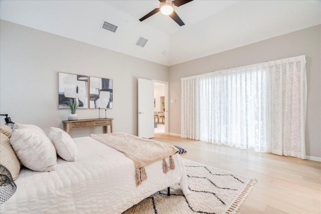 9110 Scotsman Dr, Austin, TX 78750 - bedroom featuring wood finished floors, ceiling fan, and high vaulted ceiling
