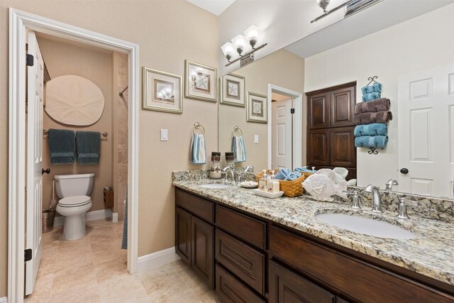 35 Forest Mesa, Round Rock, TX 78664 - bathroom featuring double vanity, tile patterned floors, and a shower