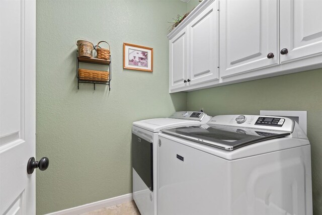 35 Forest Mesa, Round Rock, TX 78664 - laundry room featuring washer and dryer and cabinet space
