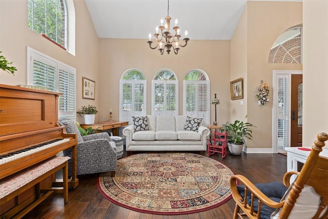 35 Forest Mesa, Round Rock, TX 78664 - living area featuring a towering ceiling, a chandelier, and dark wood-style floors