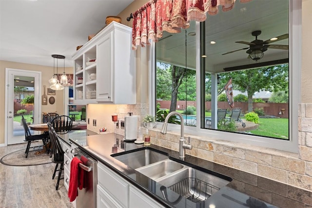 35 Forest Mesa, Round Rock, TX 78664 - kitchen with white cabinetry and plenty of natural light