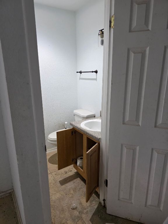 2124 Burton Dr Unit 116, Austin, TX 78741 - bathroom featuring vanity and toilet