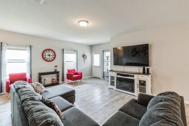 18430 Stevie Ray Dr, Round Rock, TX 78664 - living room with wood finished floors and baseboards