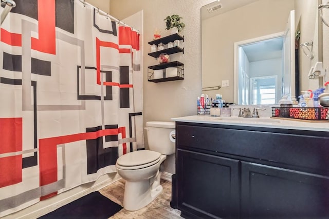 18430 Stevie Ray Dr, Round Rock, TX 78664 - full bathroom with vanity, a shower with curtain, and wood finished floors