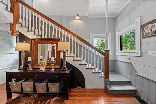 404 E 9th Ave, Belton, TX 76513 - stairway featuring hardwood / wood-style flooring and wood walls