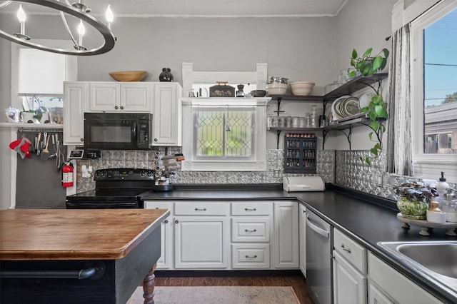 404 E 9th Ave, Belton, TX 76513 - kitchen featuring black appliances, open shelves, white cabinets, backsplash, and a chandelier