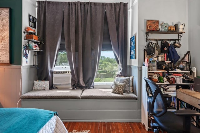 404 E 9th Ave, Belton, TX 76513 - bedroom with wood finished floors, a wainscoted wall, and cooling unit