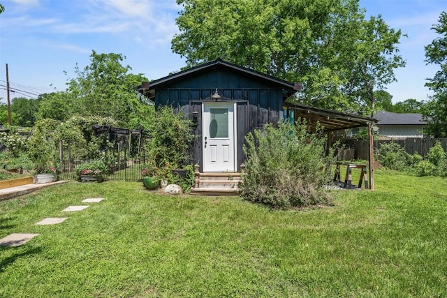 404 E 9th Ave, Belton, TX 76513 - view of outdoor structure featuring a garden and entry steps