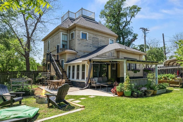 404 E 9th Ave, Belton, TX 76513 - rear view of house featuring a balcony, roof with shingles, stairs, an outdoor living space, and a patio