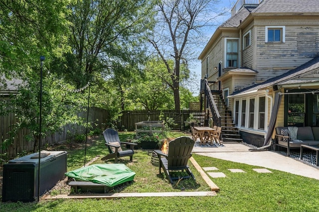 404 E 9th Ave, Belton, TX 76513 - fenced backyard featuring a patio and stairs