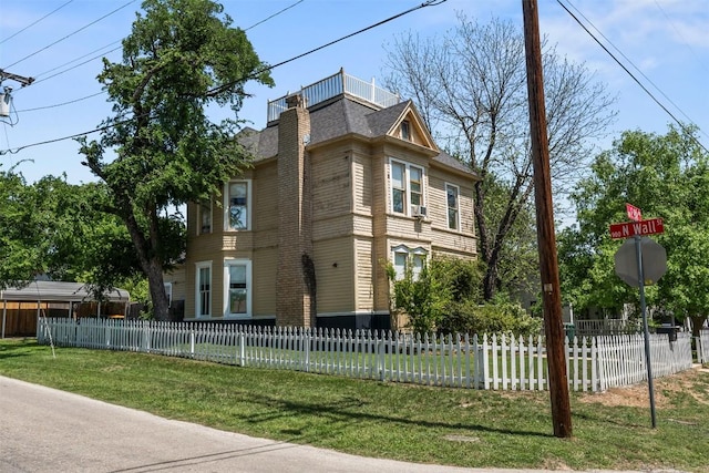 404 E 9th Ave, Belton, TX 76513 - view of property exterior with a chimney and a fenced front yard