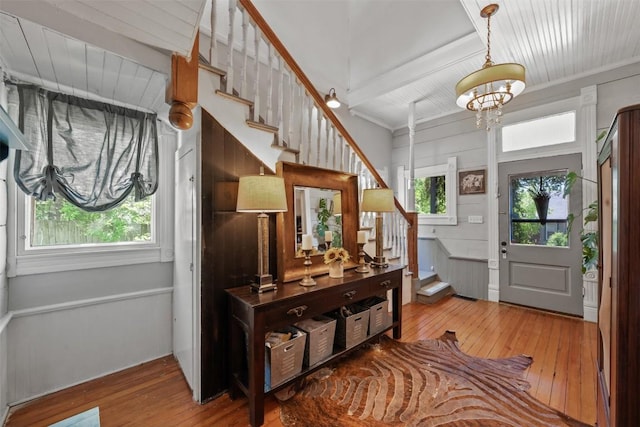 404 E 9th Ave, Belton, TX 76513 - foyer with hardwood / wood-style floors, stairs, a chandelier, and wood ceiling