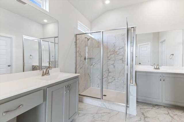 241 Snowbell St, San Marcos, TX 78666 - full bathroom with marble finish flooring, a marble finish shower, two vanities, recessed lighting, and vaulted ceiling