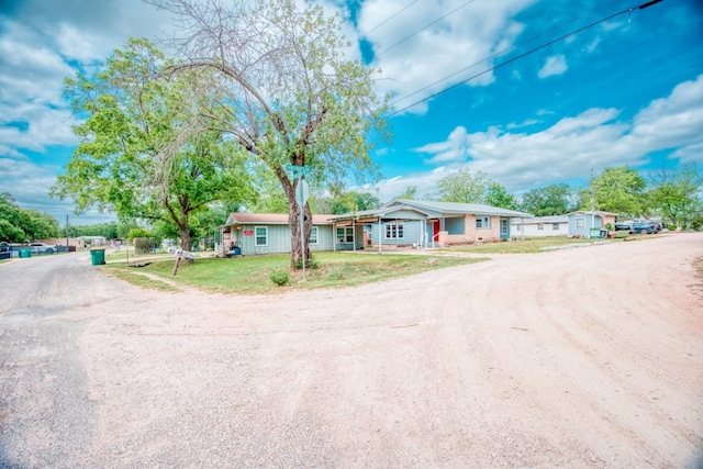 1030 Kingsriver Dr, Granite Shoals, TX 78654 - single story home featuring driveway and a front yard