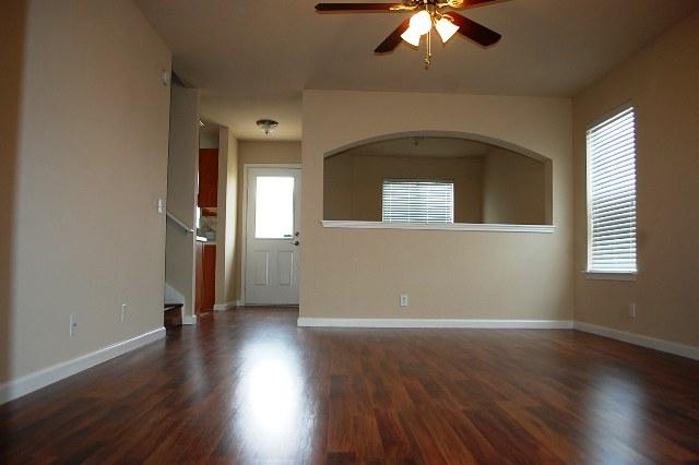 205 E Mitchell Dr, Hutto, TX 78634 - unfurnished room featuring ceiling fan and wood finished floors