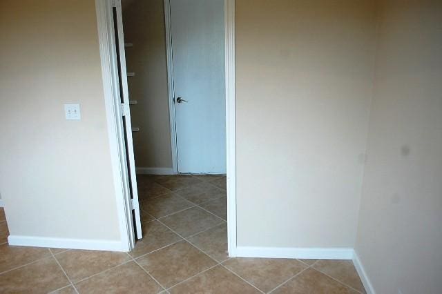205 E Mitchell Dr, Hutto, TX 78634 - hallway with tile patterned flooring