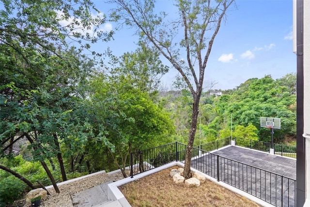 1501 Ridgecrest Dr, Austin, TX 78746 - view of yard with a balcony and a forest view