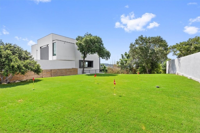 1501 Ridgecrest Dr, Austin, TX 78746 - view of yard featuring an area to practice putting