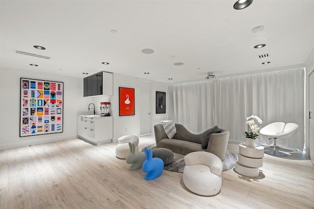 1501 Ridgecrest Dr, Austin, TX 78746 - living area featuring light wood-style flooring and recessed lighting