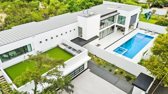 1501 Ridgecrest Dr, Austin, TX 78746 - view of subject property featuring a pool